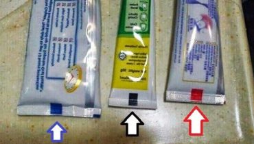 Que signifient les bandes de couleur sur les tubes de dentifrice ?